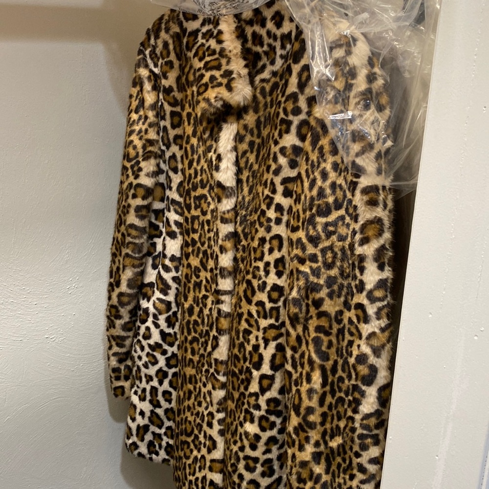 Calvin Klein NWT faux fur jacket. Petite small. Has pockets. Never worn